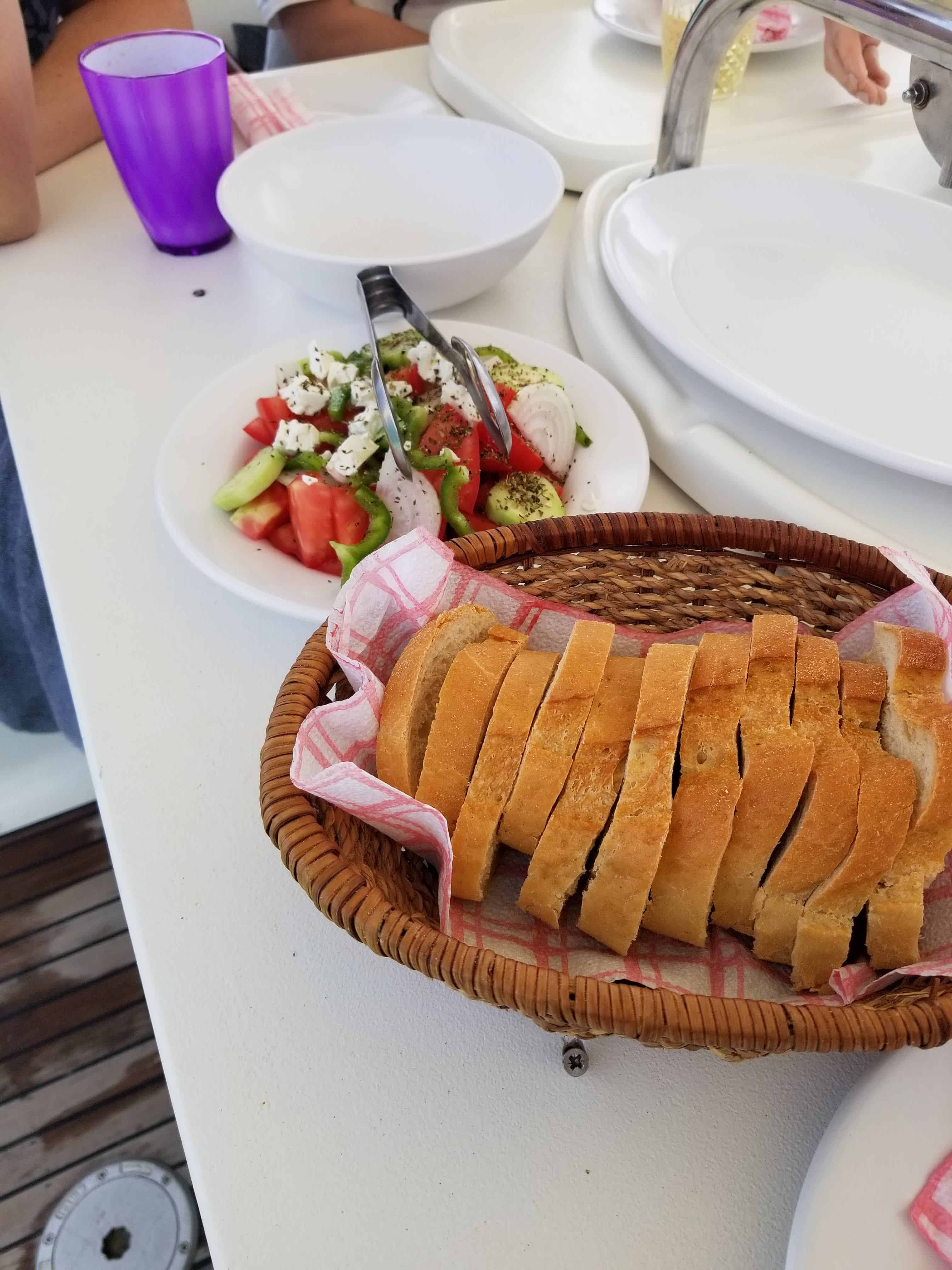 fresh bread and Greek salad