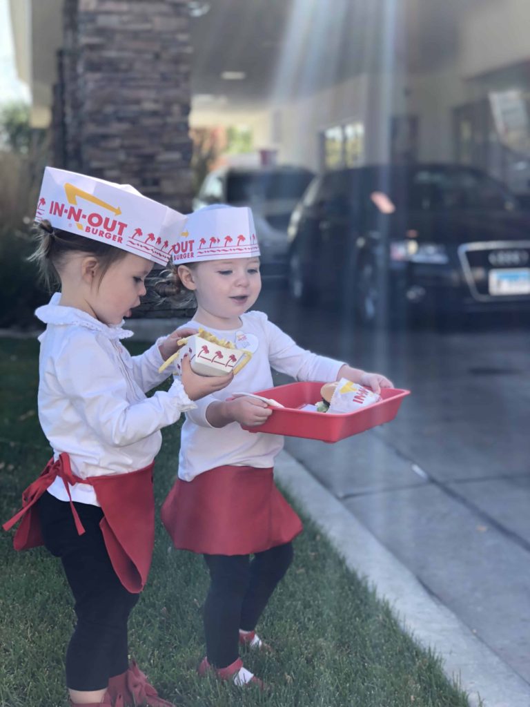Toddlers dressed as In-N-Out workers at the drive-thru