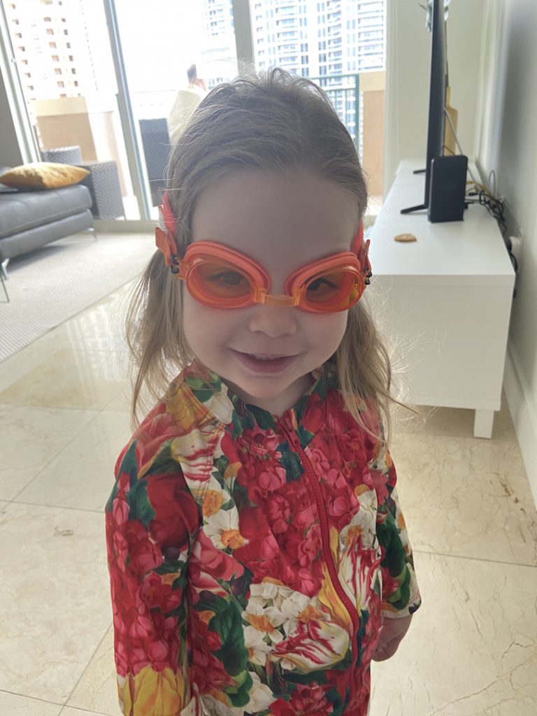 Lila wearing her new goggles with a neoprene elastic band